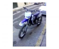 Moto de cross por coche - 1/1