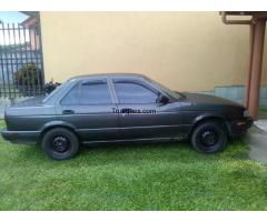 Nissan sentra b13 mod 94, 4 puertas, automatico y moto freedom zs 150 cc mod 2015 - 1/1