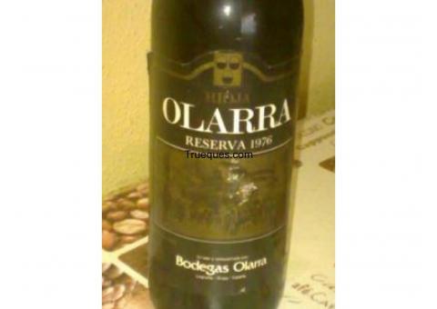 Cambio botella de vino de bodegas olarra de rioja del año 1976