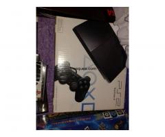 Canjeo play station 2 con guitarra, alfombra y karaoke, 2 joystick y juegos - 1/1