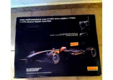 Coche radio control, formula 1 pirelli a escala 1:10 en su caja original.