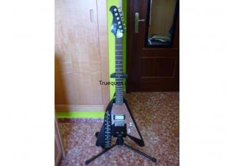 Guitarra gibson flying v por coche o moto de 50cc