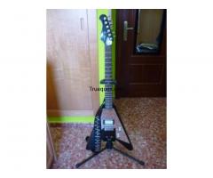 Guitarra gibson flying v por coche o moto de 50cc - 1/1