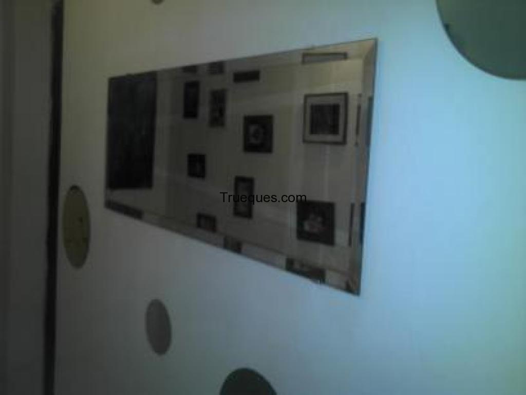 10 espejos redondos mas uno central rectangular