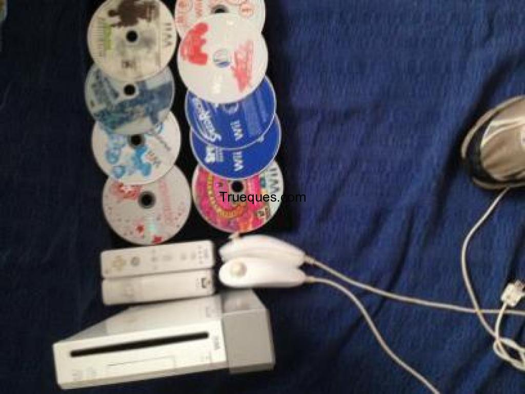 Wii con 2 controles con 9 juegos inclullendo super smash y mario carr y call of duty 2controles