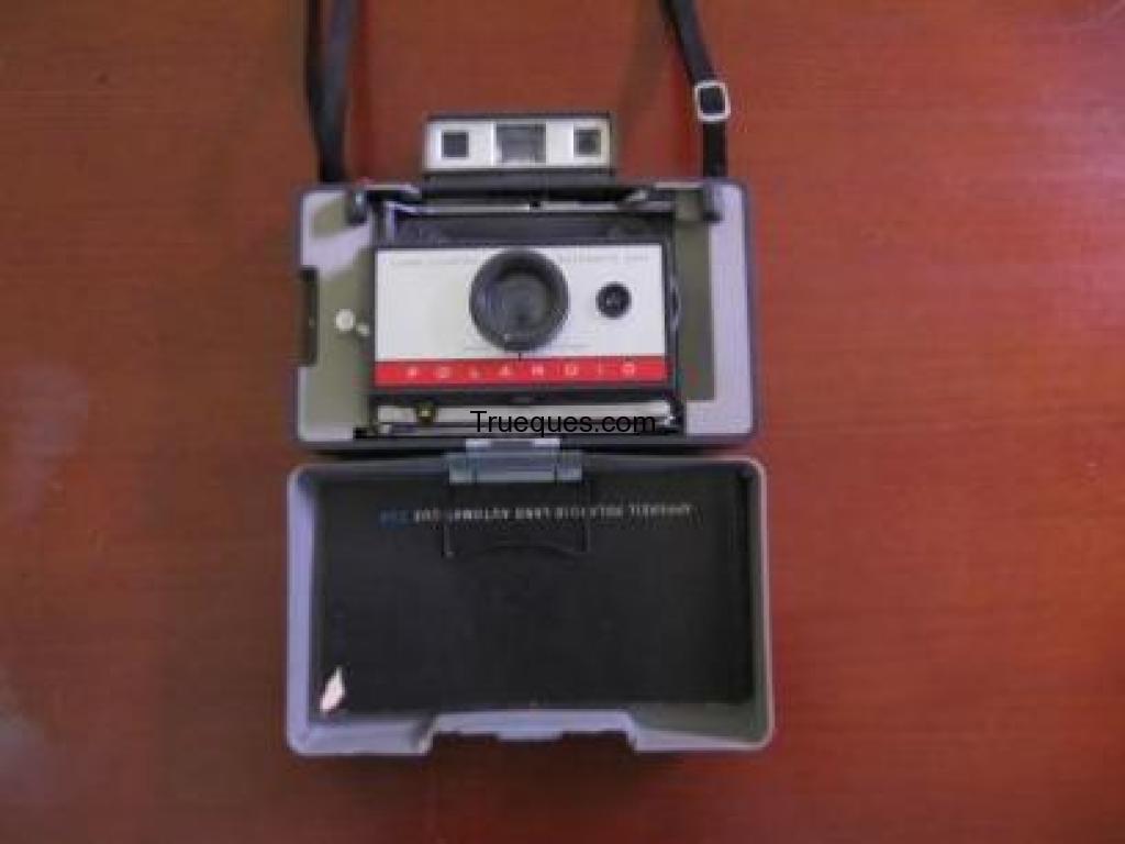Camara polaroid y canon