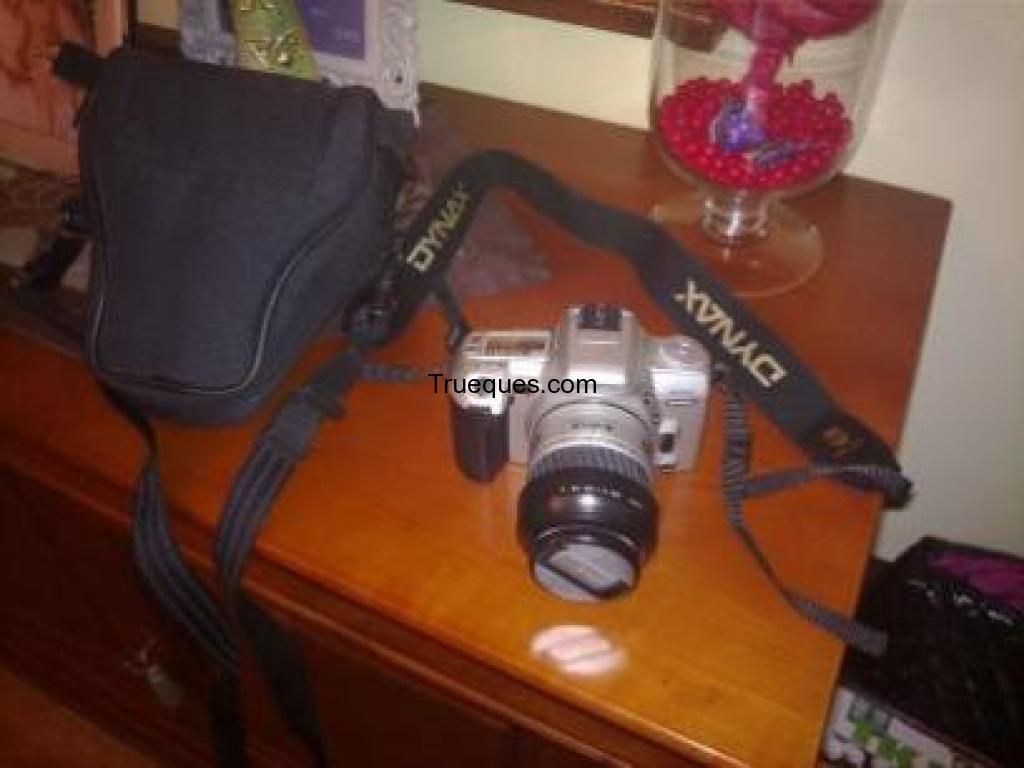Camara reflex minolta dynax 404si por reloj de pulsera con gps