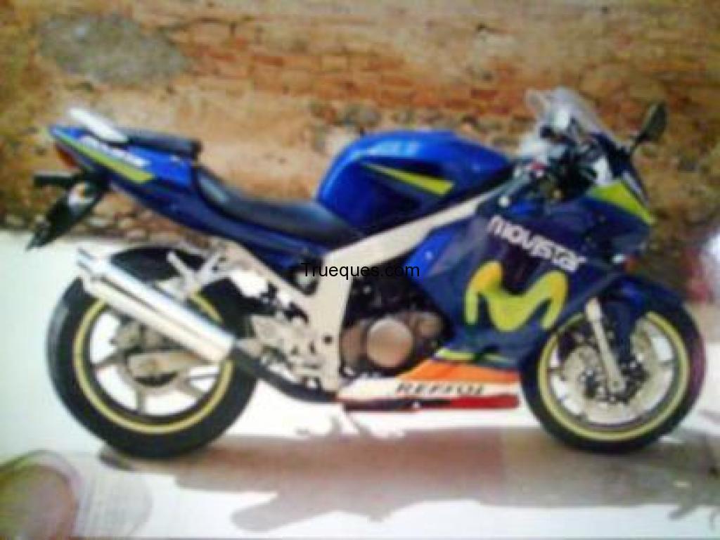 Cambio moto hyosung por portatil