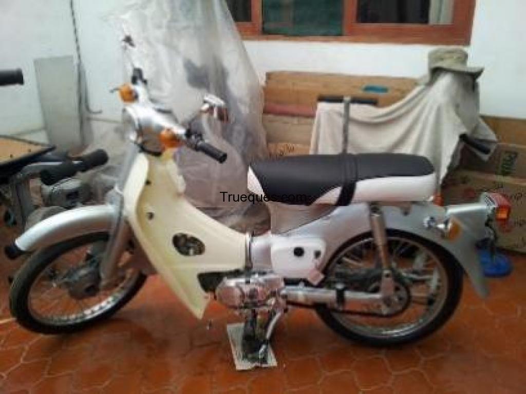 Moto honda c50 del 77