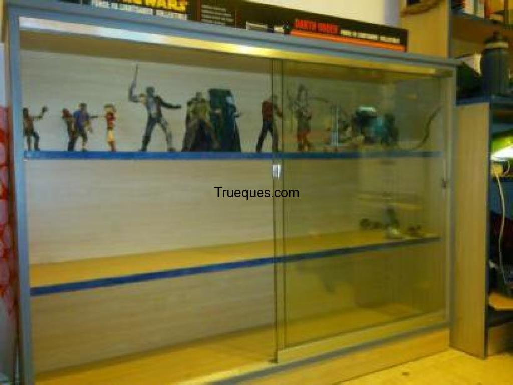 Lote de 200 peliculas vhs y vitrina de madera y cristal