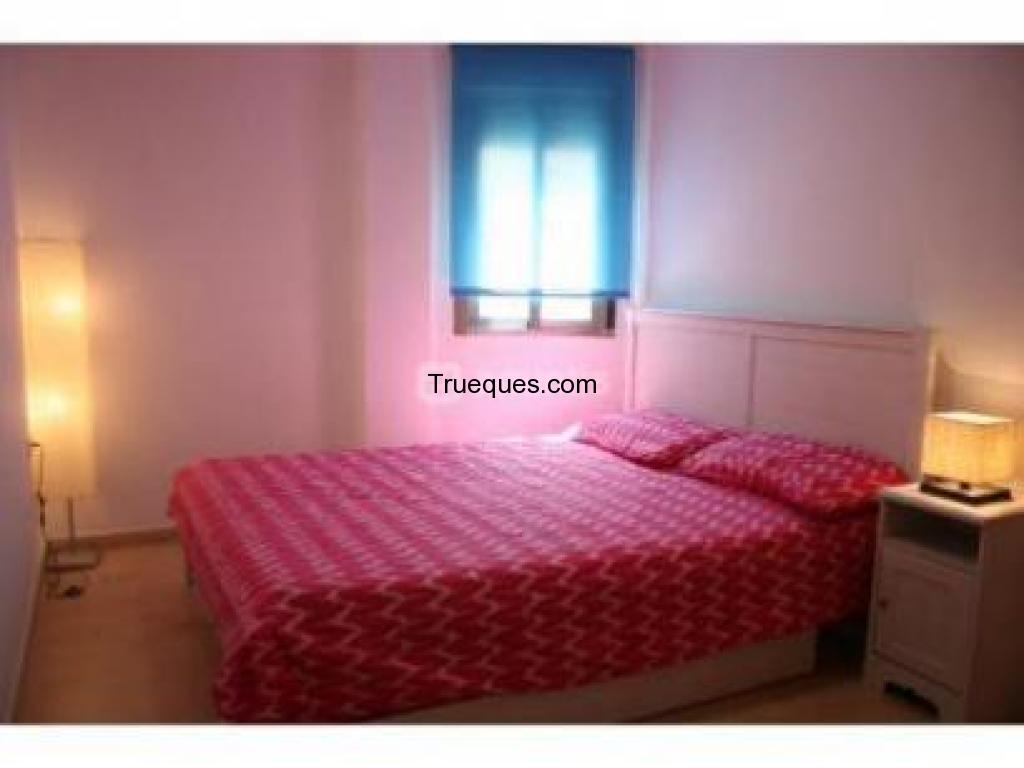 Cambio piso nuevo en oliva por piso en madrid