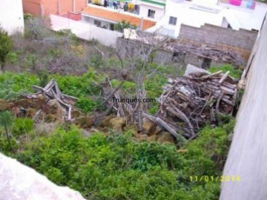 Solar urbano por terreno de asentamiento rural